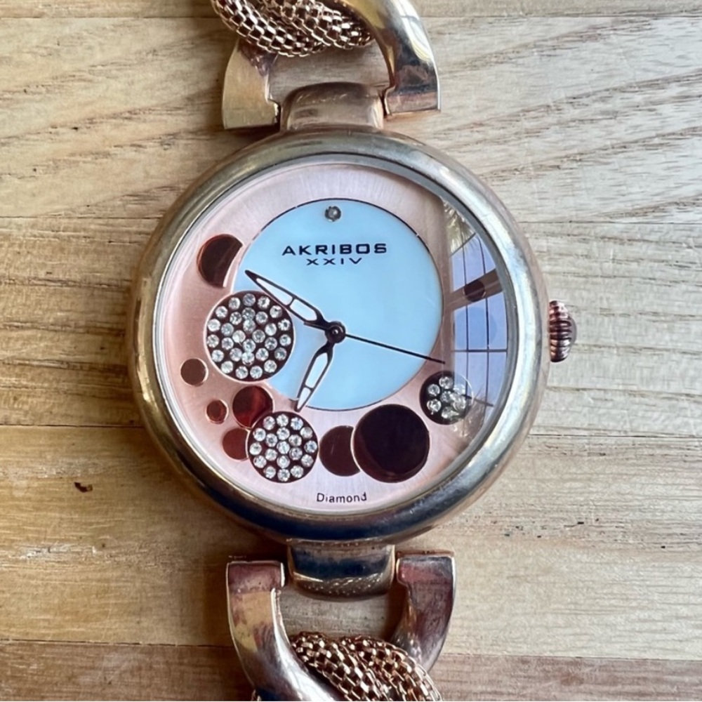 Akribos XXIV ladies rose gold tone fashion bracelet watch NEW BATTERY
